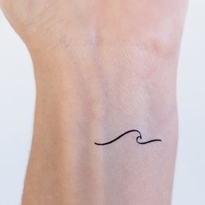 simple wave temporary tattoos in 4 different sizes
