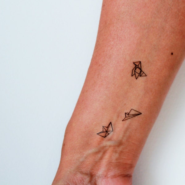 paper aeroplane temporary tattoo