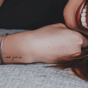 never give up temporary tattoo (set of 4)