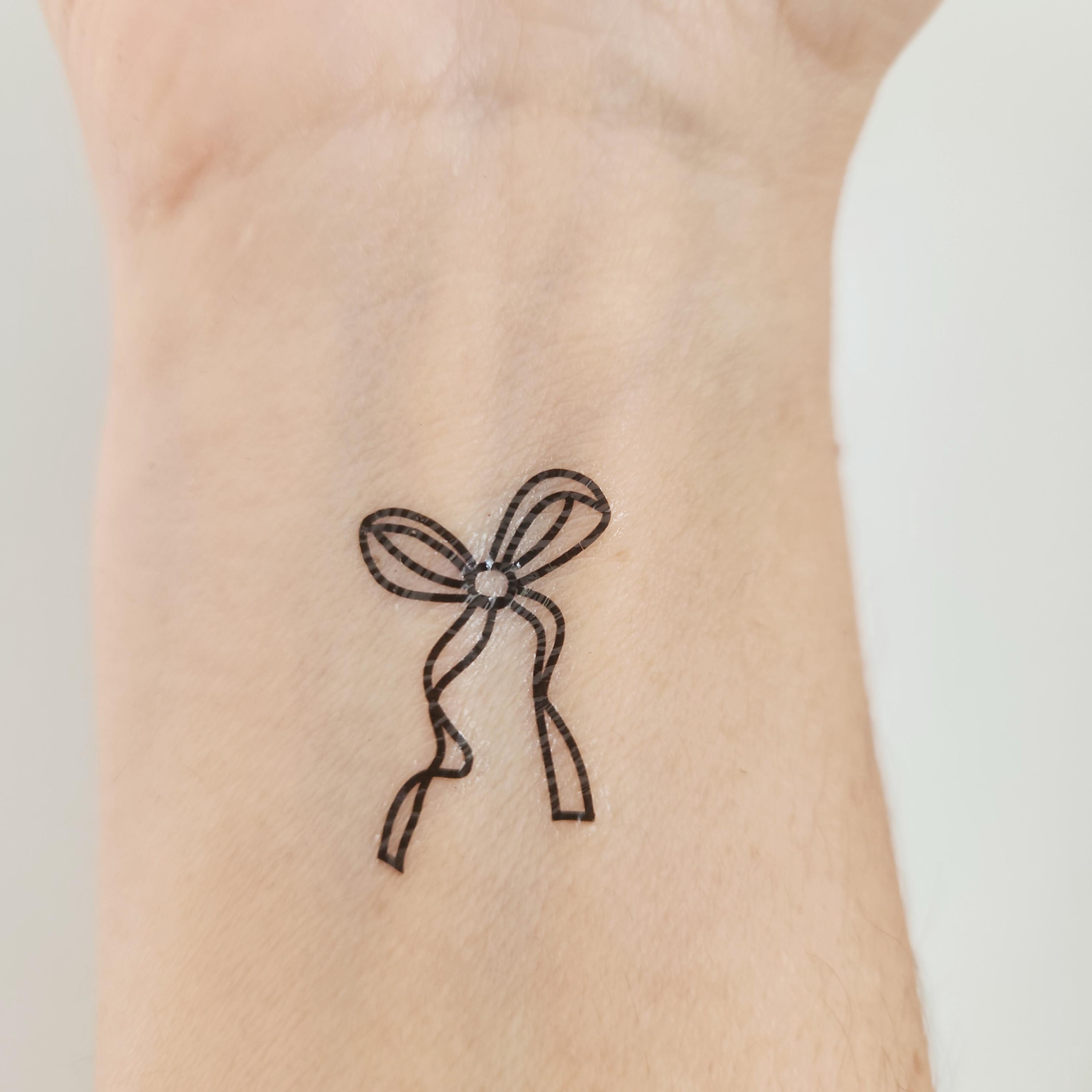 Adorable Ribbons & Bows Tattoos for Any Occasion