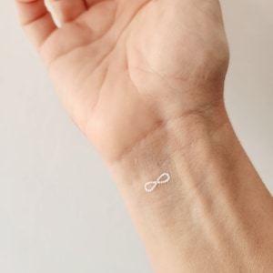 white infinity sign temporary tattoos (set of 12)