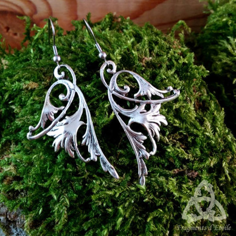 Long-silver Victorian fairy wing earrings dangling interlacing esoteric magic medieval magic pagan rebirth
