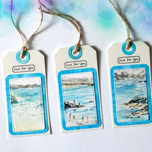 3 gift tags featuring watercolour paintings of Cornish coastal scenes