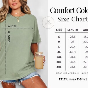 May include: A woman wearing a sage green t-shirt, holding a glass with a straw. The image includes a size chart for the "1717 Unisex T-Shirt" with measurements in inches, including length and width for sizes S through 4XL.