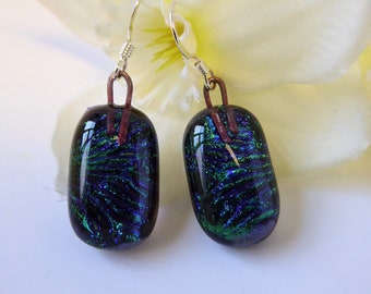 Green fused glass earrings with flower pattern. Emerald green dichroic glass earrings. Dark green floral earrings. Green flower earrings.