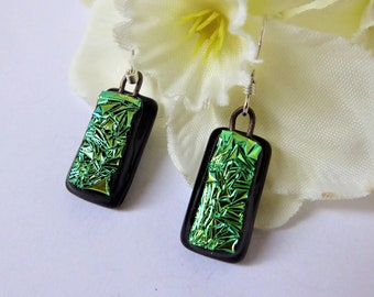 Green/black dichroic glass earrings. Fused glass earrings with pale green textured pattern on a black background.Lime green glass earrings.