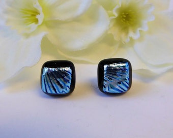 Silver and black dichroic glass stud earrings. Fused glass earrings with silver flower pattern. Fused glass silver/black stud earrings.