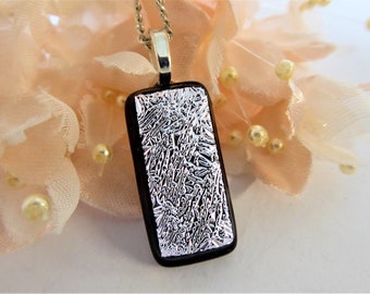 Silver/black dichroic glass pendant with a textured pattern. Silver-black fused glass necklace. Pretty silver glass pendant.