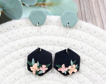 Matte Black and Sea Foam Green Hanging Hexagonal Polymer Clay Earrings with Floral Details