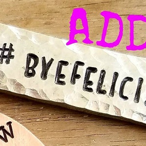 ADD-ON ONLY---- add on a tag for a name/date/initials or stamping on the back charge.