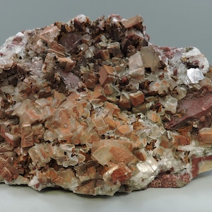 Large calcite with hematite from Mexico – fluorescent - large cabinet size