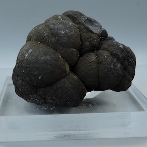 Romanechite with pyrolusite on stand from Spain – miniature