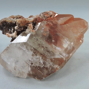 Double terminated calcite crystal with hematite, fluorite and baryte from China – fluorescent -miniature