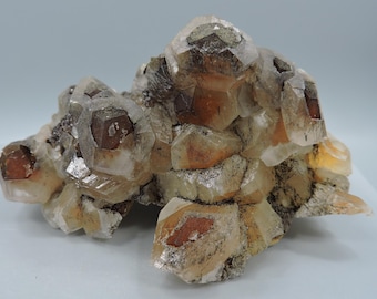 Orange/red SW fluorescent calcite from Mexico – cabinet size