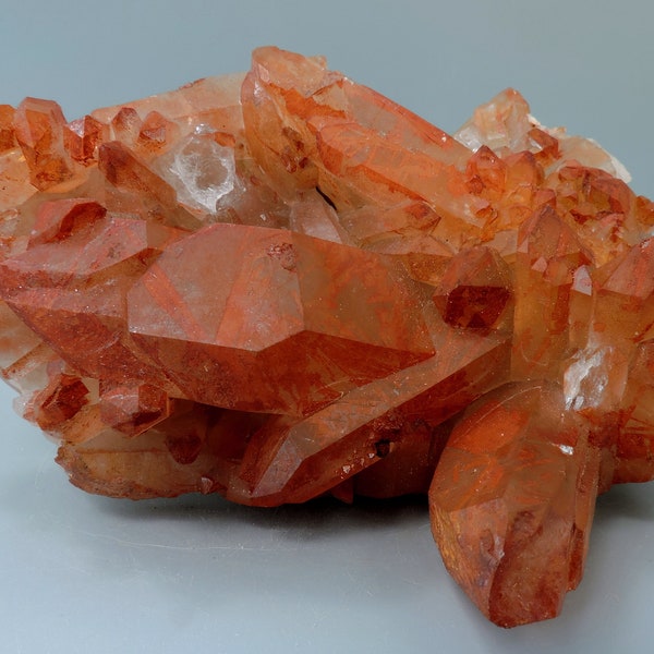 Red quartz cluster from Morocco – cabinet size