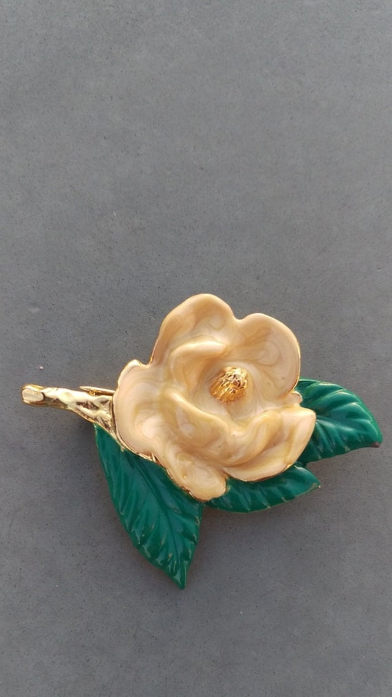 Gold, peach and green enameled vintage brooch, dog