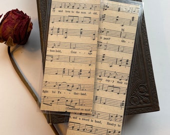 Pair of handmade laminated double sided bookmarks w/ vintage music paper