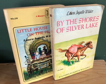 Pair of Laura Ingalls Wilder Books vintage softcovers illustrated