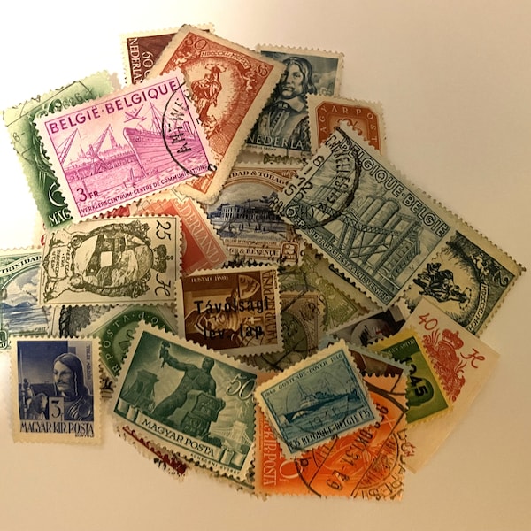 Bundle of 50 colorful International Vintage Postage Stamps most postmarked