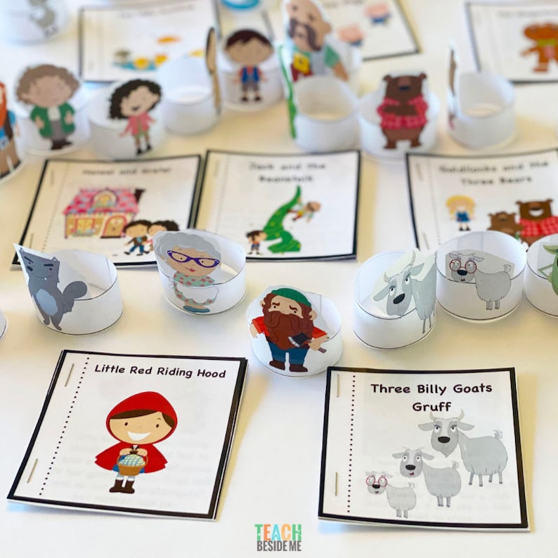 May include: A set of printable activity cards featuring popular children's fairy tales. Each card has a title and an illustration of a character from the story. The cards are designed to be used for educational purposes, such as storytelling, role-playing, or creating a classroom display.