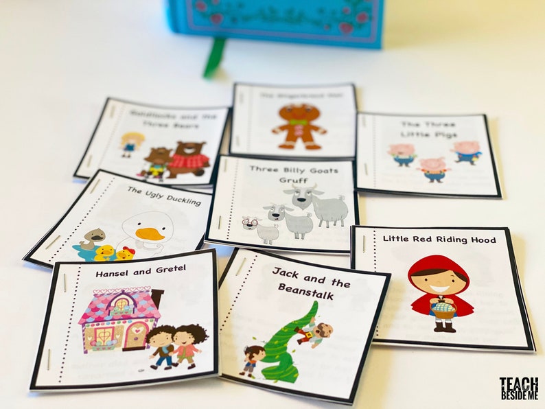 May include: A set of nine mini books featuring classic fairy tales. The books are illustrated with colourful cartoon characters and feature titles such as "The Ugly Duckling", "Three Billy Goats Gruff", "Hansel and Gretel", and "Jack and the Beanstalk".