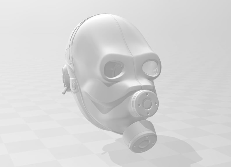 May include: A white plastic gas mask with a round filter and a clear visor. The mask has a textured surface and a strap that goes around the head.