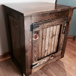 Rustic pine bathroom vanity with a planked top, beadboard door and oil-rubbed bronze hinges, stained dark walnut