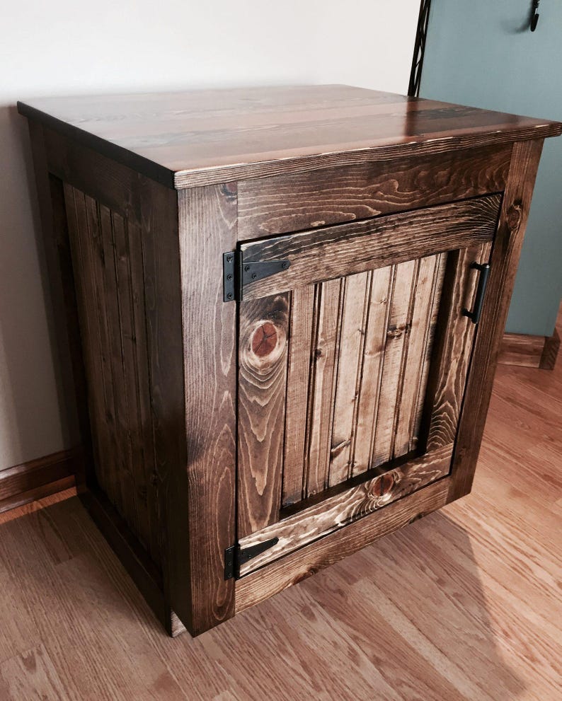 Rustic pine bathroom vanity with a planked top, beadboard door and oil-rubbed bronze hinges, stained dark walnut