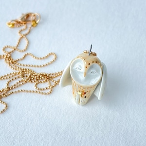 Porcelain owl necklace decorated with 22k gold