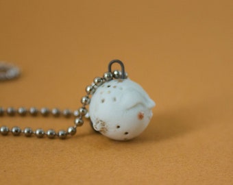 Moon face ooak porcelain pendant handsculpted