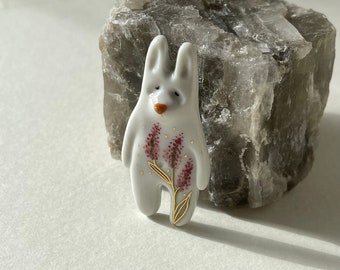Porcelain pin rabbit decorated with  22k gold