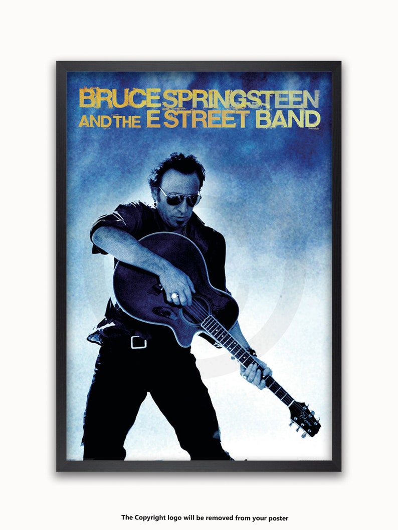 May include: A black and white poster featuring Bruce Springsteen and the E Street Band. The poster has a blue background with a white silhouette of Bruce Springsteen playing a guitar.