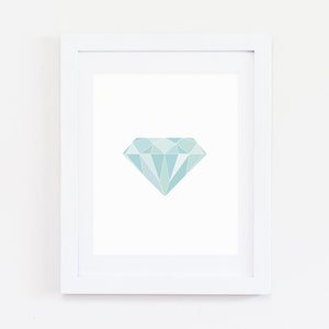 May include: A framed print of a light blue geometric diamond shape on a white background.