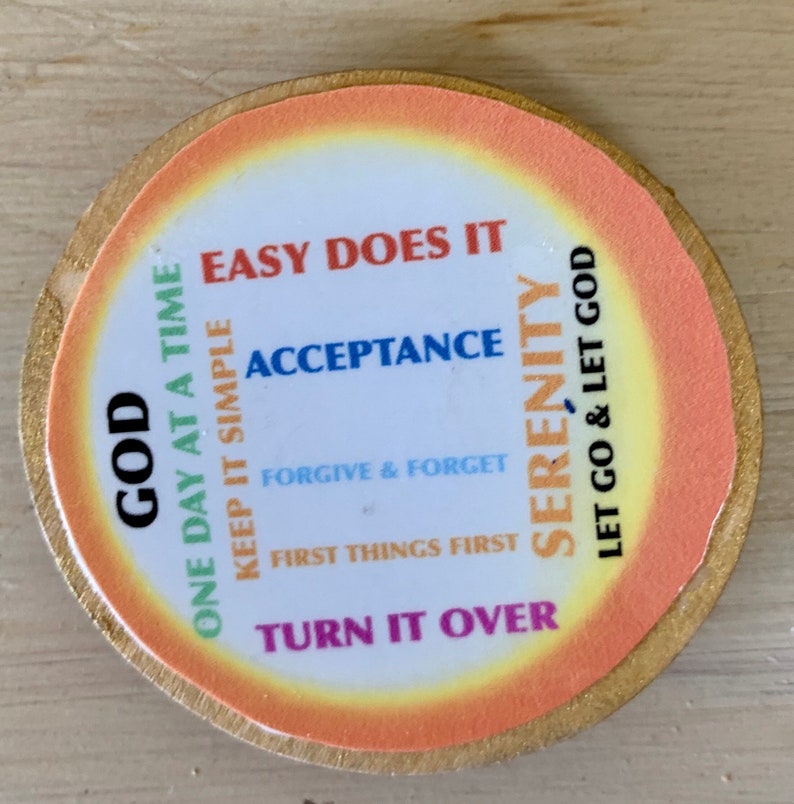 Wooden Recovery Magnet Featuring 12 Step Slogans and Words Suitable for placement on a Refrigerator or Metal Surface.