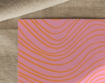 Placemat abstract - orange lines on pink background. DIN A 3.