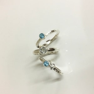 Set of 3 Stack Rings set with Blue Topaz & White Topaz