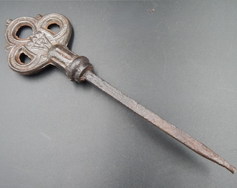 Authentic antique cast iron stove key, vintage draft control piece