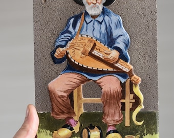 Vintage Enamel Lava Tile Painting: Jean Borel "Hurdy-Gurdy Musician"