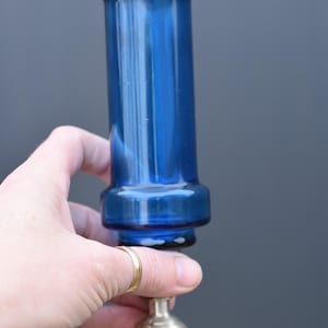 vintage candle holder made of blue glass and white metal ,made in Ceuta -Spain