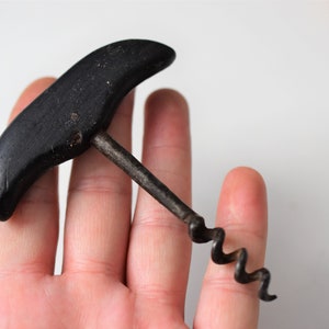 antique corkscrew, bottle opener