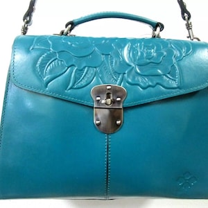 Bolso satchel Jules de piel repujada en color verde azulado de Patricia Nash (Nuevo Testamento)