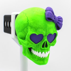 May include: A set of three ceramic mugs with a speckled, matte finish. Each mug features a different color: light blue, cream, and gray. The mugs have a simple, modern design and a comfortable handle.