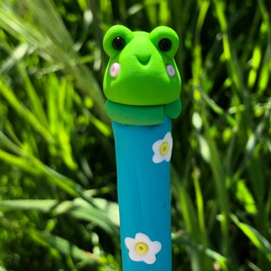 Crochet hook flowers and frog on lily pad polymer clay handmade to order crochet hook!