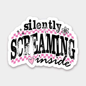 May include: A white sticker with the words "silently SCREAMING inside" in black, distressed font. The text is set against a pink and white checkered background, with a small flower, stars, and a heart graphic.