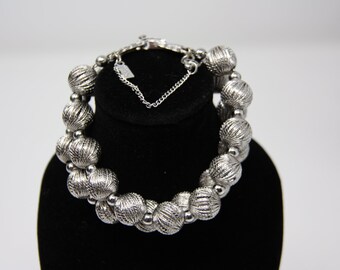 Costume jewelry silver bead Monet bracelet