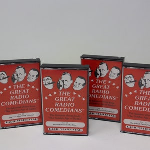 May include: Five cassette tapes with red labels and black cases. The labels feature black and white illustrations of men and the text "The Great Radio Comedians" with the tagline "The Funniest Shows from "The Golden Age of Radio."