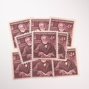 May include: A collection of eight vintage United States postage stamps featuring Andrew Carnegie. The stamps are all 4¢ and feature a portrait of Carnegie and the text "United States Postage" and "Andrew Carnegie".