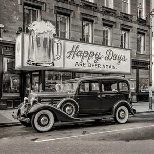 May include: A black and white photo of a vintage car parked in front of a building with a sign that reads 