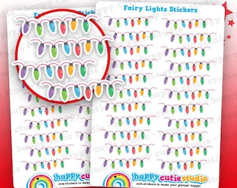 Puede incluir: Hojas de pegatinas blancas con diseños de luces de hadas coloridas. Las pegatinas incluyen luces rojas, verdes, amarillas y moradas. El texto incluye "Fairy Lights Stickers!" y "cute stickers to make your planner happy!"