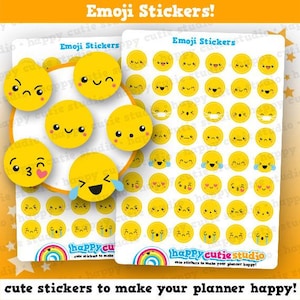 May include: Two sheets of yellow emoji stickers with various facial expressions. The stickers include happy, sad, laughing, and winking faces. The text "Emoji Stickers!" and "happy cutie studio" are visible.